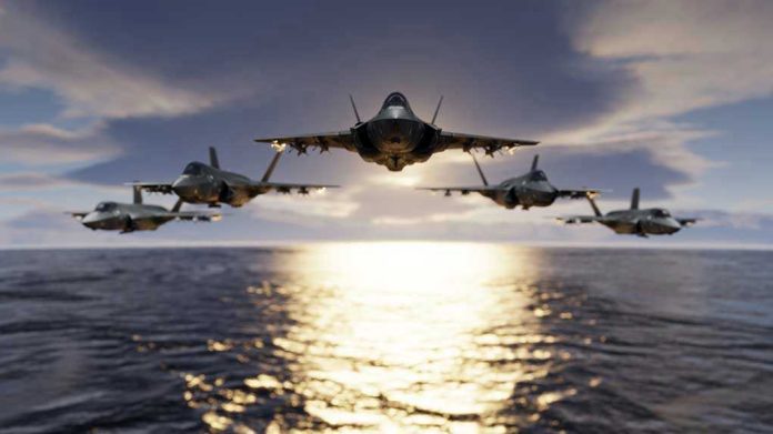 1593281419-1 Five jets flying low over the ocean at sunset.