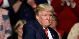 Trump Says Iran Deal Report Is a HOAX Donald Trump points toward the audience at an event