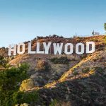 Susan Sarandon Says Hollywood Is STILL Punishing Her Hollywood Sign on a sunlit hillside