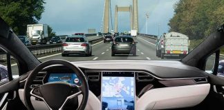 See Inside GM’s New Split-Screen Dashboard Change Self-driving car interior on a busy bridge highway