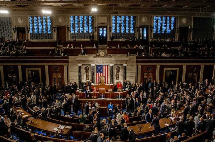 shutterstock_1186368277-5 U.S. House chamber with lawmakers gathered before a session