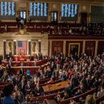 House chamber filled with lawmakers during a session