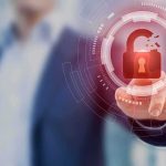 How Your Driver’s License Could Be for Sale RIGHT NOW Hand touching holographic broken padlock icon