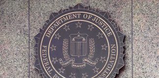 FBI seal mounted on a granite wall