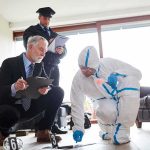 House Of Horrors: 5 Women Dead Forensic investigator collects evidence as police and detective observe
