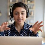 See What Parents Are Doing to HELP Their Kids Land Jobs Woman wearing headset on video call