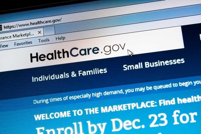 shutterstock_166171757 Screenshot of the HealthCare.gov website with enrollment information