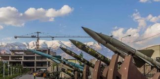 Row of missiles on display outdoors