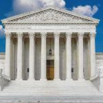 J&J’s $5.5B Gamble Leaves Victims Waiting United States Supreme Court building with classical columns