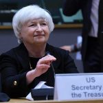 Kick-His-Ass Clip Hides Housing Shake-Up older woman at conference table with nameplate and microphone