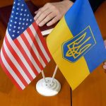 Russia Opens Door to NEW Ukraine Peace Talks U.S. and Ukrainian flags on a table