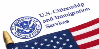 U.S. flag beside U.S. Citizenship and Immigration Services document