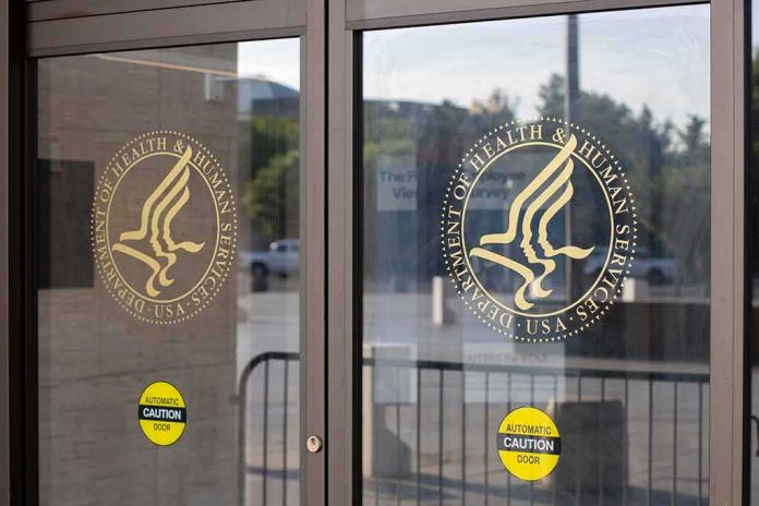 shutterstock_2185661343 glass entrance doors with government agency seals