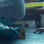 7-Year-Old Boy Tortured to Death by ‘TRANS MOMS’ in Ohio Home forensic investigator in protective suit examining crime scene markers