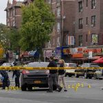 Murder Shock: Ex-Minister Found Dead Police investigate a taped-off urban street crime scene