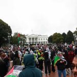 Protesters Hit Washington as Trump Hosts Xi Walter Jones among protesters in front of the White House