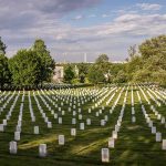 Snipers At Arlington? Trump’s Wild Pivot Rows of white headstones in a cemetery under a partly cloudy sky