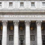 Supreme Court JOLTS Alabama Map Fight United States courthouse facade with Corinthian columns