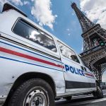 Key Epstein Scout Found Dead—Answers Vanish Police van near the Eiffel Tower