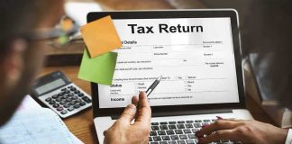 Laptop displaying tax return form