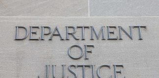 Department of Justice inscription on stone wall