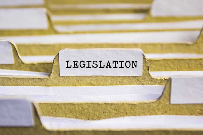 shutterstock_506543236 File folder tab labeled legislation