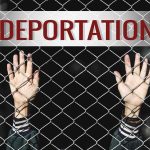 Judge Flags Free-Speech Retaliation Hands gripping chain-link fence with deportation sign
