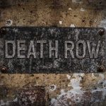Supreme Court Clears Way for RARE Female Execution Rusty metal sign on worn concrete wall