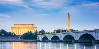 Arlington Memorial Bridge with Lincoln Memorial and Washington Monument at dusk