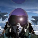 Government UFO Clips Fuel Angels vs. Demons Debate fighter pilot in cockpit with two jets flying in formation