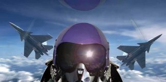 fighter pilot in cockpit with two jets flying in formation