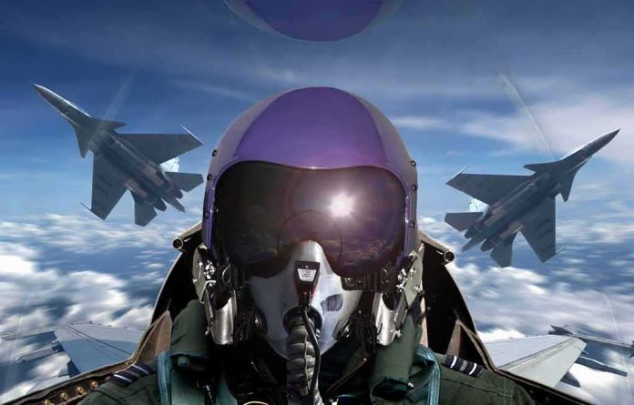shutterstock_727299742 fighter pilot in cockpit with two jets flying in formation