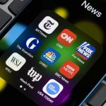 Accused CHINESE Operative Goes After US Reporter News app icons on a smartphone screen.