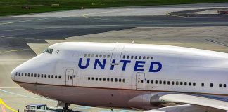 Accused United Hijacker SLEPT Through Diversion United Airlines Boeing 747 being towed on an airport taxiway