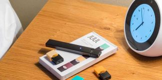 Vape BAN Could Send Ex-Smokers Back to Cigarettes vape pen and pods on a wooden nightstand