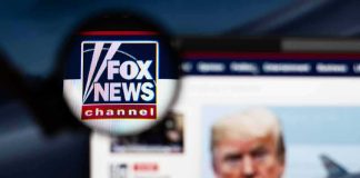 Trump Says Fox Isn’t HELPING Republicans magnified fox news logo over blurred website