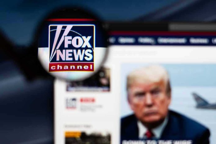 shutterstock_1288386304-1 magnified fox news logo over blurred website