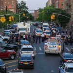 7 STAB WOUNDS Couldn’t Stop This NYPD Detective Police vehicles and officers block a city street during an active scene