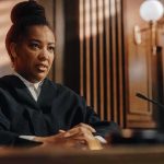 Judge in courtroom speaking from the bench