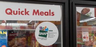 Military Freezers May Have Been HACKED Grocery freezer door labeled Quick Meals with SNAP program sticker