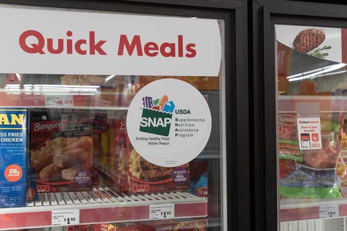 Grocery freezer door labeled Quick Meals with SNAP program sticker