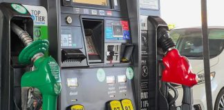 Trump Makes BIG Move to Lower Diesel Prices Gas pump with green diesel and red gasoline nozzles