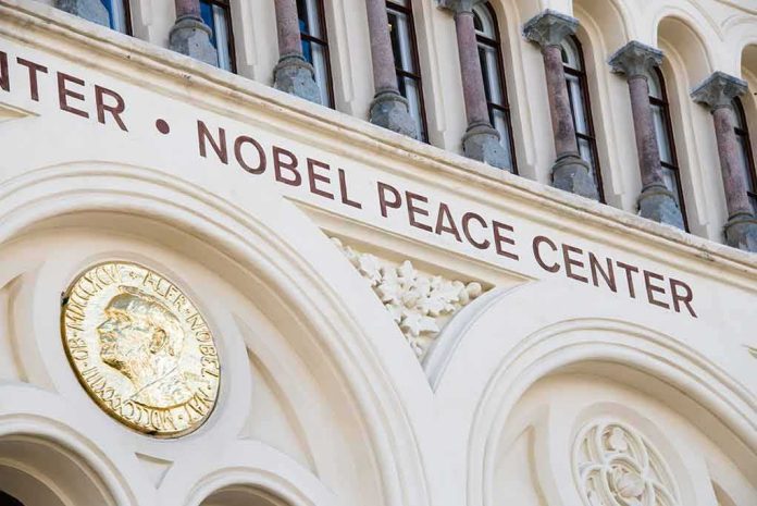 shutterstock_273963650 Nobel Peace Center facade with arched windows and gold medallion