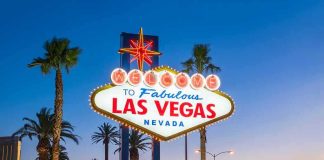 Las Vegas Streets LITERALLY Under Water Welcome to Las Vegas sign at dusk