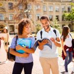 UCLA Group’s October 7 Plan Sparks OUTRAGE College students walking on campus with books and backpacks